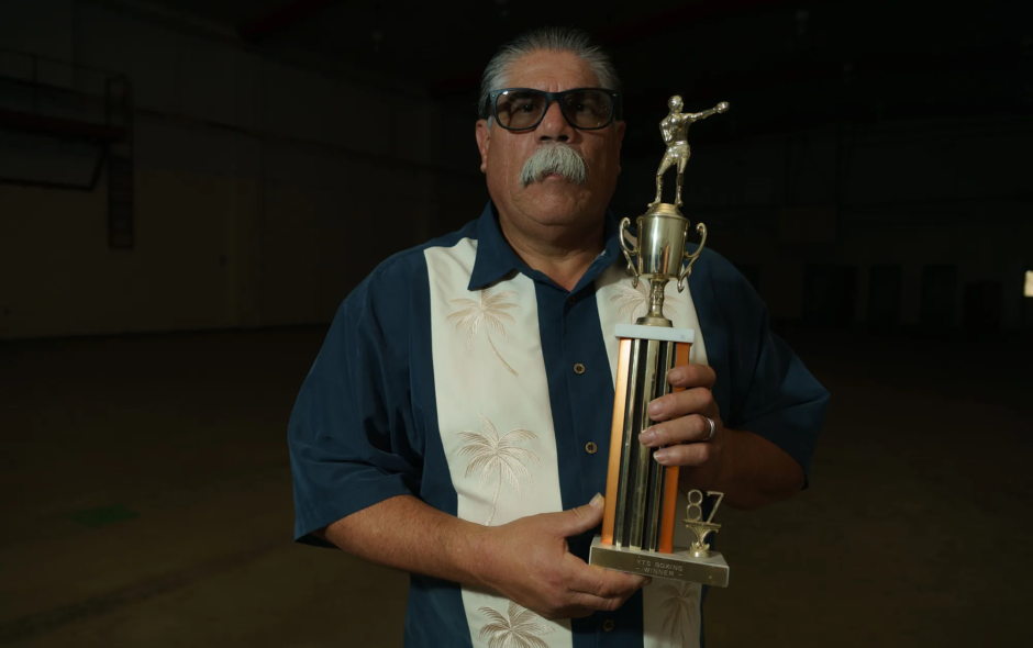 Tony Espinosa is photographed in the YTS boxing gym with his trophy in 2024 by David William Reeve