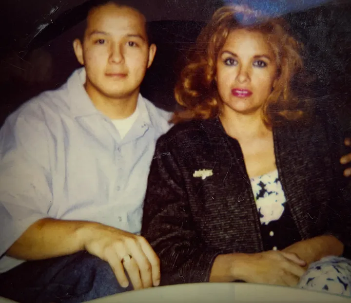 Jaime and his mother are photographed during visitation at YTS.